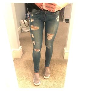 Distressed ripped jeans